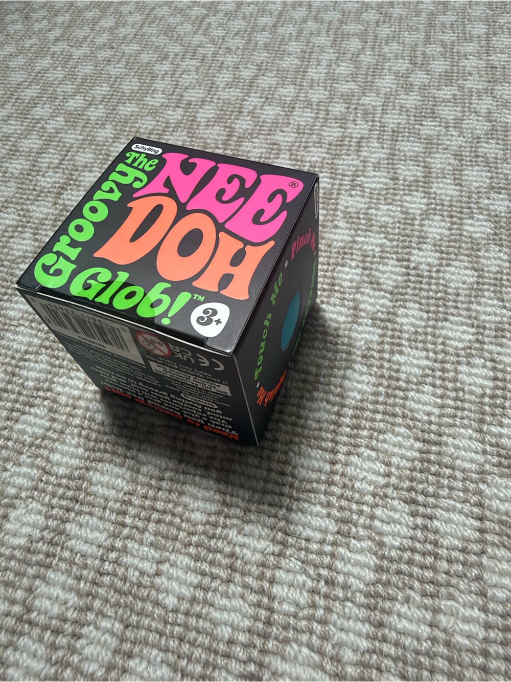Brand new Schylling NeeDoh Groovy Glob in blue, in original retail packaging